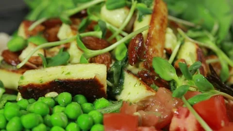 Vegan salad with grilled cheese Stock Footage 140996953
