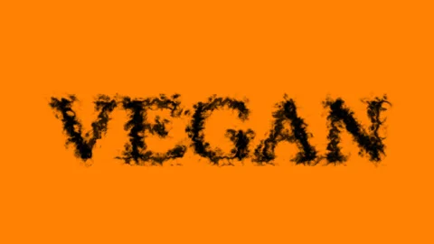 Vegan smoke text effect orange isolated background Video stock 138722936