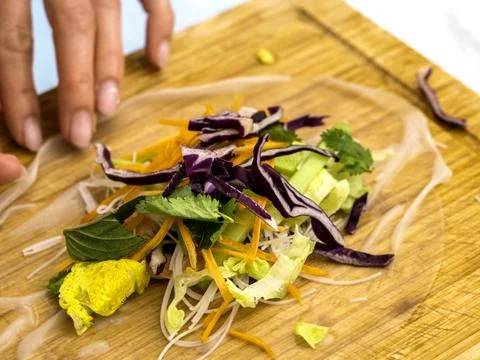 Vegan spring rolls prepared vegetables wrapped in rice transparent natural fo Stock Photos