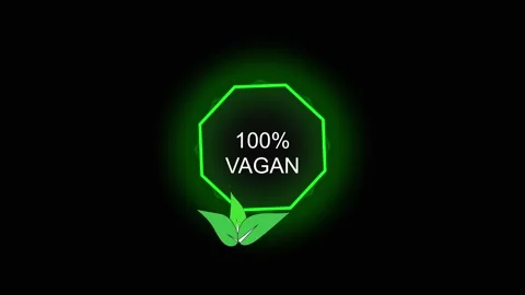 Vegan text on green octagon with organic leaves. Vegan symbol for plant bas.. Stock Footage 337814432