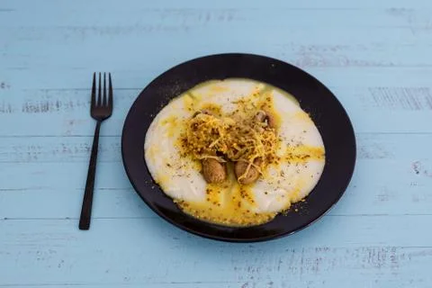 Vegan version of bangers and mash potato with veggie sausages topped with sau Stock Photos