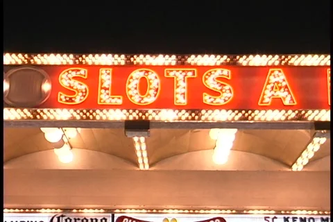 Vegas slots neon sign flashing Stock Footage