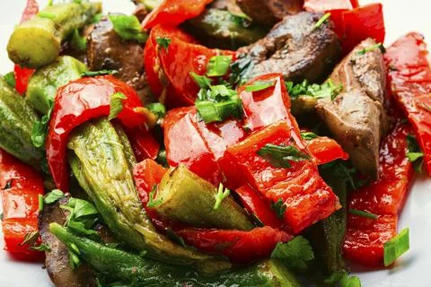 Vegetable and liver salad. Stock Photos