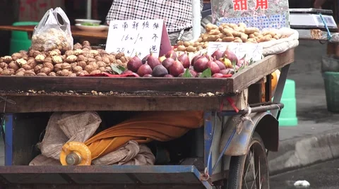Vegetable and Potato on Back of Vendors Tricycle City Streets Of Chengdu Stock Footage 56576488