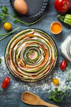 Vegetable and prosciutto pie Stock Photos