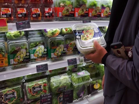Vegetable and salad in plastic packaging Stock Footage 110091309