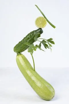 Vegetable art composition - abstract balancing construction of fresh green Stock Photos