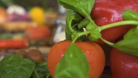 Vegetable background on kitchen table close up. Fresh vegetable, seasoning for Video stock 98445088