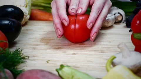 Vegetable background.Two halves of a tomato Stock Footage 78055993