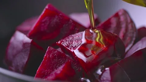 Vegetable beet and olive oil in slow motion, beetrout close up Video stock 147881320