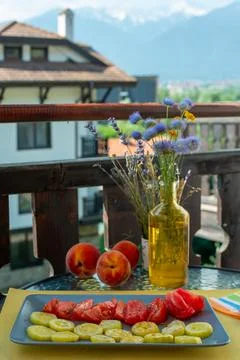 Vegetable breakfast on the terrace in summer Stock Photos