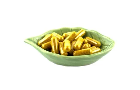 Vegetable capsule on white background Foto stock