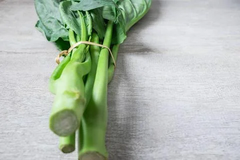Vegetable Chinese kale on white background Stock Photos