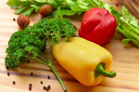Vegetable composition and food background. Bell pepper, herbs, seasoning for Stock Photos
