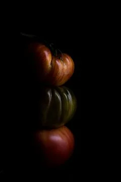 Vegetable composition with ripe bright tomatoes. Balancing creative concept. low Stock Photos