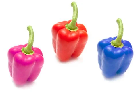 Vegetable composition of the three colored peppers Stock Photos