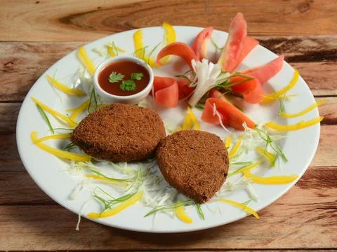 Vegetable cutlet, a delectable combination of mashed potatoes and vegetables. Stock Photos