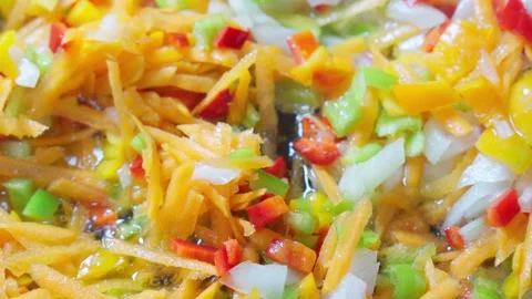 Vegetable dish is fried in frying pan in oil. Stock Footage 289275809