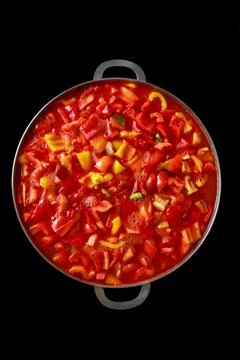 Vegetable dish lecso made from tomatoes and sweet peppers. Stock Photos