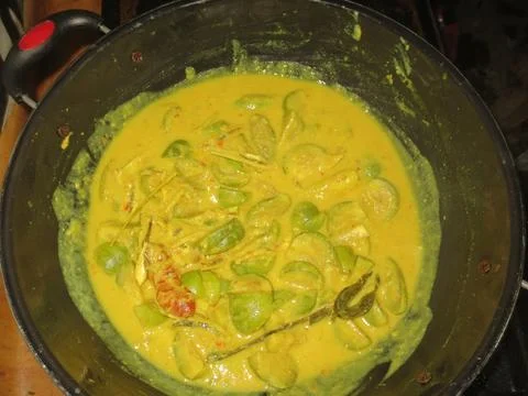 Vegetable eggplant in a cauldron with thick coconut milk. Eggplant and durian Stock Photos