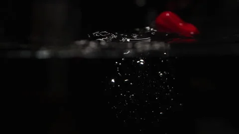 Vegetable falling into Water Stock Footage 254592753