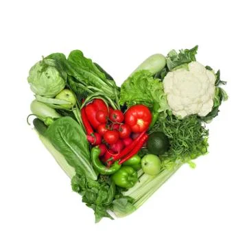 Vegetable heart on white Stock Photos