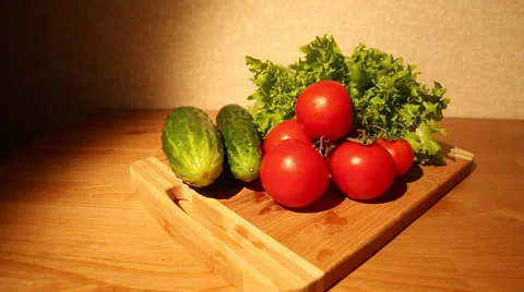 Vegetable ingredients on cutting board pan Stock Footage 49684540