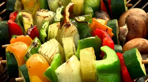 Vegetable kebabs on a barbecue Stock Footage 8572324