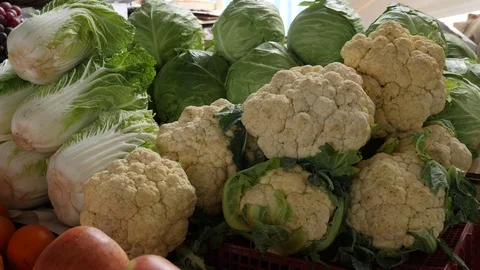 Vegetable on the market in a basket Stockbeeldmateriaal 121905785