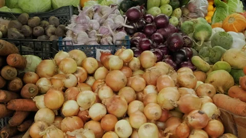 Vegetable market. Root and tuber crop on the retail shelf. Vegan food Stock Footage 219913550