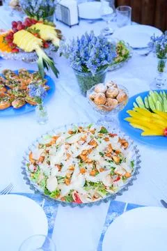 Vegetable, meat, fruit snacks on the table Stock Photos