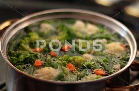 Vegetable mix cooking Stock Photos