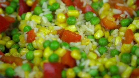 On the vegetable mix pepper is poured. Stock-Footage 88156649