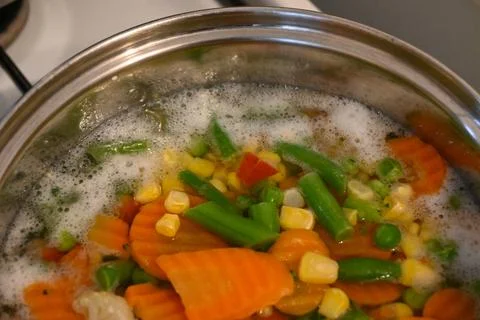 Vegetable mix simmering in a pot Stock Photos