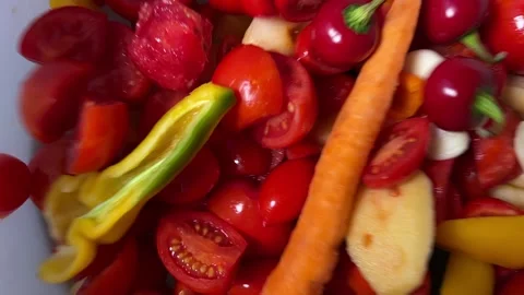 Vegetable is mixed in the container Stock Footage 220740452