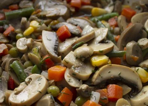 Vegetable mixture with stewed mushrooms Stock Photos