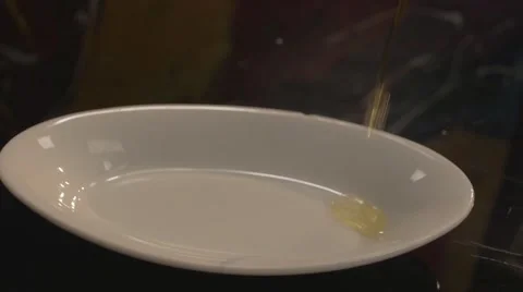 Vegetable oil on a plate Video stock 62640163