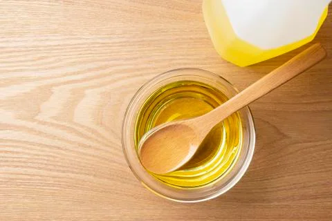 Vegetable oil on the table. Stock Photos