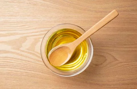 Vegetable oil on the table. Stock Photos