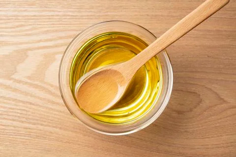 Vegetable oil on the table. Stock Photos