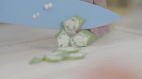 Vegetable Okra is cutting to a small Stock Footage 243119737