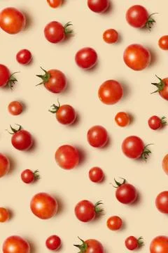 Vegetable pattern with ripe fresh organic cherry tomatoes. Stock Photos