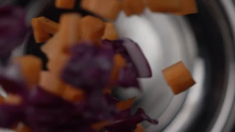 Vegetable pieces, slow motion Stock Footage 98511783