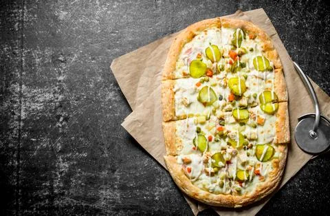 Vegetable pizza on paper. Stock Photos