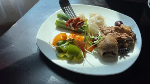 Vegetable plate fork plate fork Grilled asparagus served in restaurant on a Stock Footage 317698842