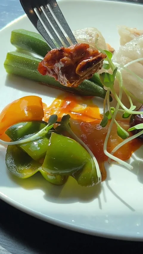 Vegetable plate fork plate fork Grilled asparagus served in restaurant on a Stock Footage 317698928