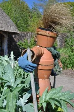 Vegetable plot scarecrow in an English garden Foto stock