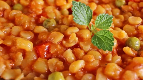 Vegetable pottage food closeup texture pattern seamless looping rotating video Stock Footage 102748953