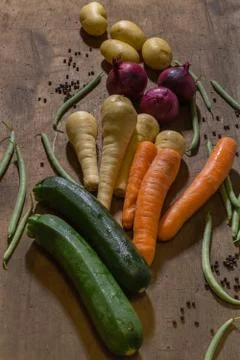 Vegetable produce on a wooden table Stock Photos