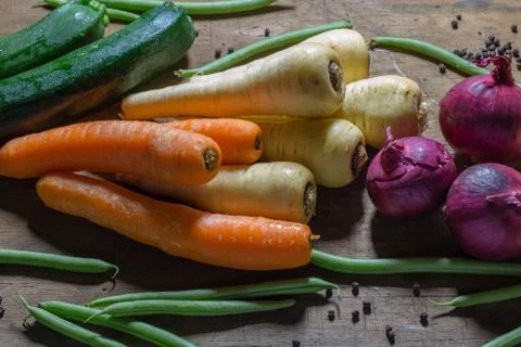Vegetable produce on a wooden table Stock Photos